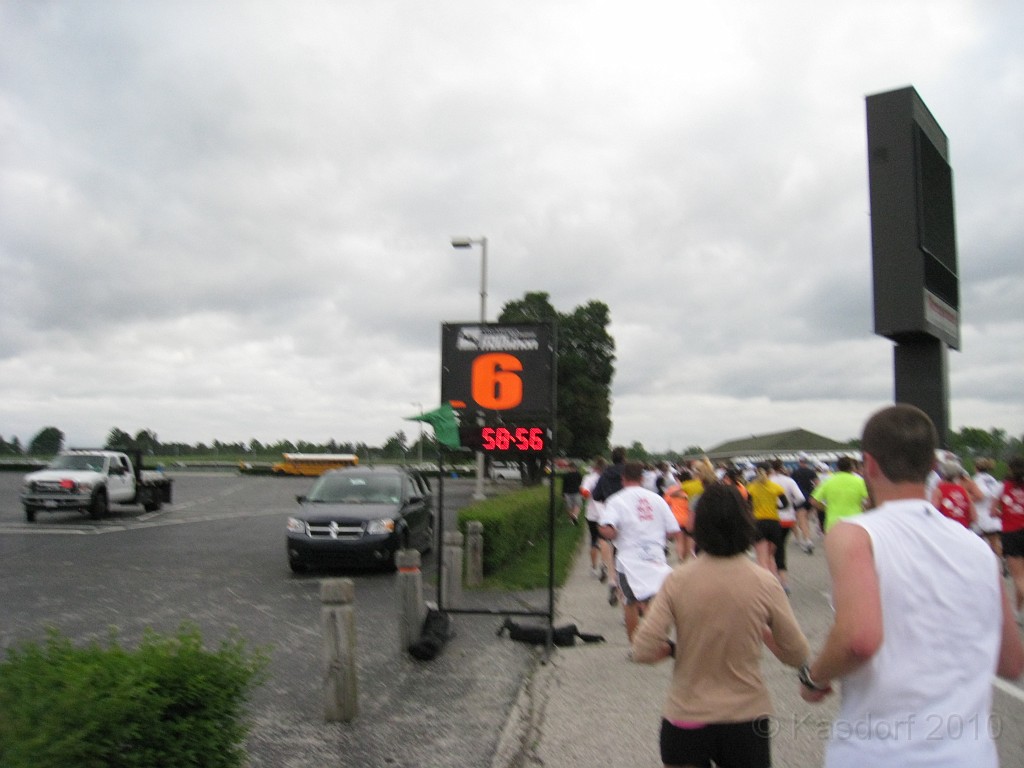 Indy Mini-Marathon 2010 255.jpg - Mile marker six on the track. Still pretty good time.. remember there is a several minute difference in gun time and chip time.